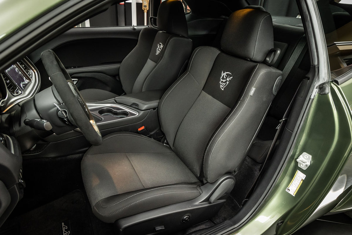 Demon seats with embroidered logo
